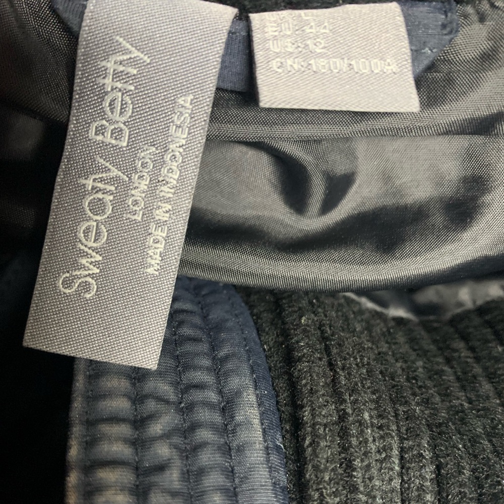 Sweaty Betty Black Navy Puffer Venture Fleece Padded Vest Size 12 - Picture 5 of 6
